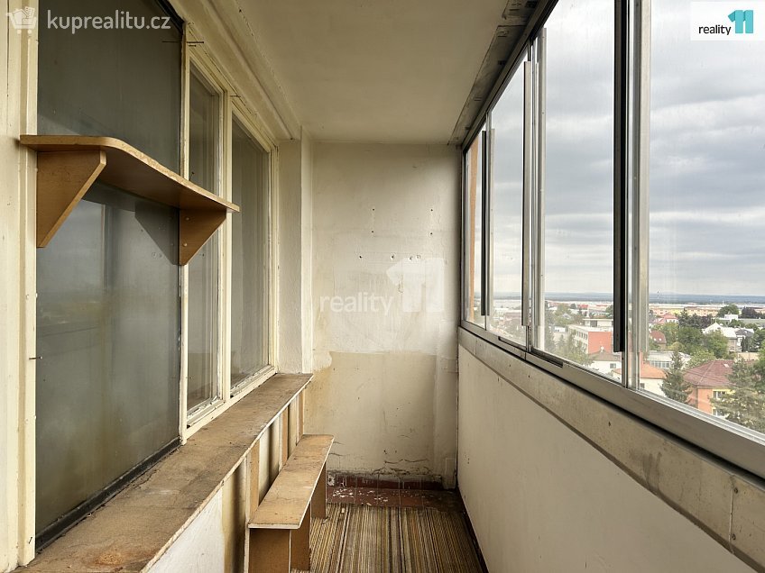 Prodej bytu 3+1 73 m^2 Běluňská, Praha 20 