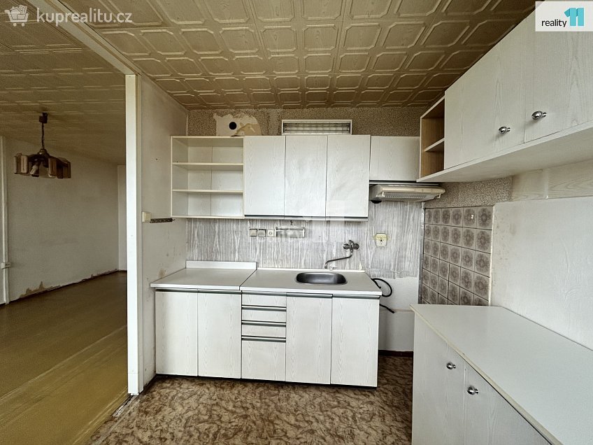 Prodej bytu 3+1 73 m^2 Běluňská, Praha 20 