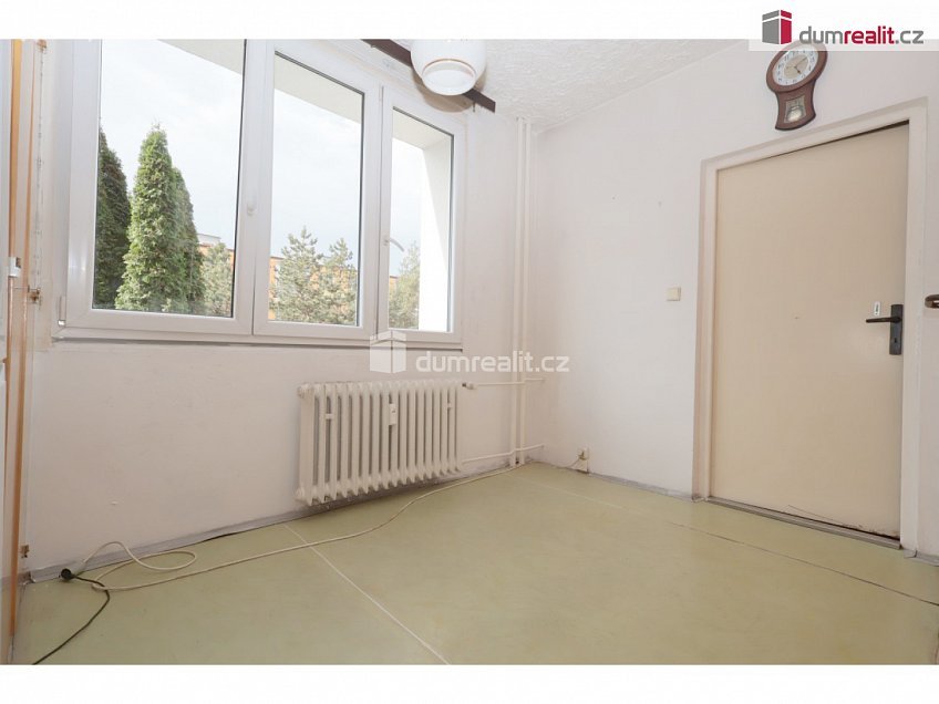 Prodej bytu 2+1 66 m^2 Hokejová, Praha 15 