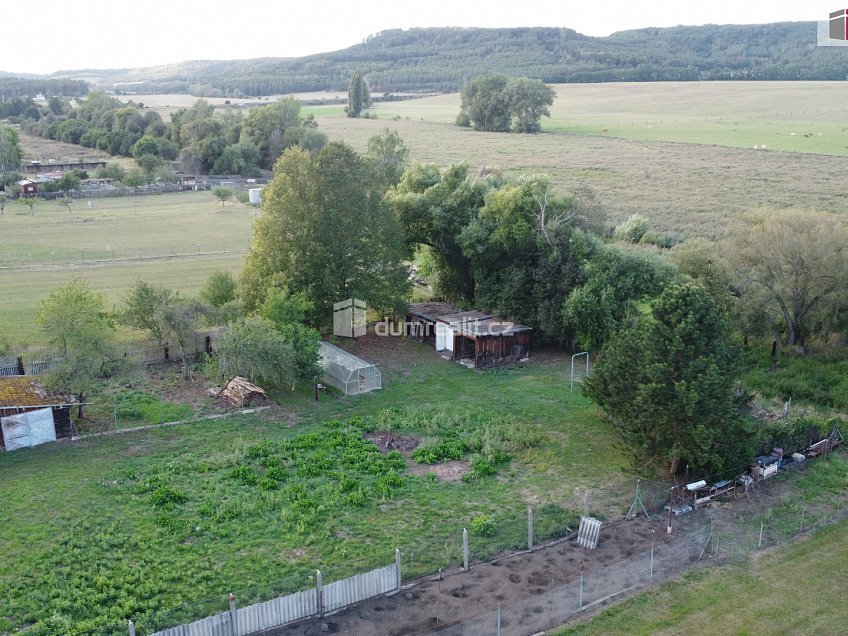 Prodej  stavebního pozemku 810 m^2 Nádražní, Vroutek 