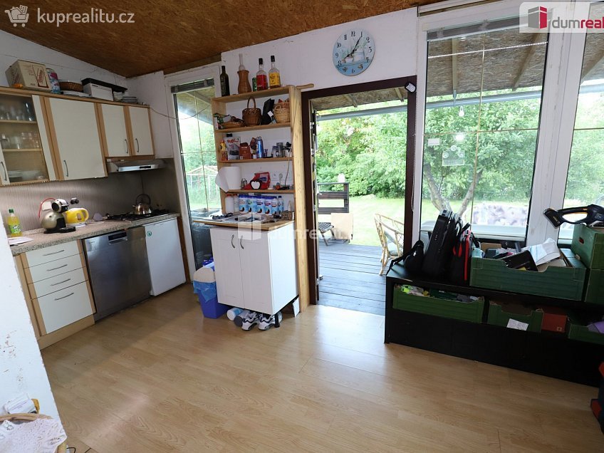 Prodej  chaty 35 m^2 Starosuchdolská, Praha-Suchdol 
