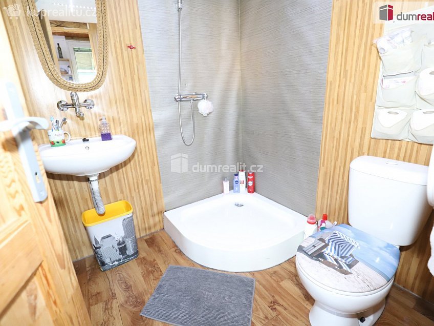Prodej  chaty 35 m^2 Starosuchdolská, Praha-Suchdol 