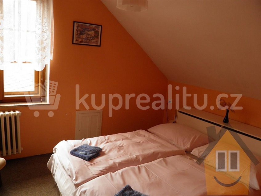Prodej  ubytovacího zařízení 150 m^2 Karlovice 79323
